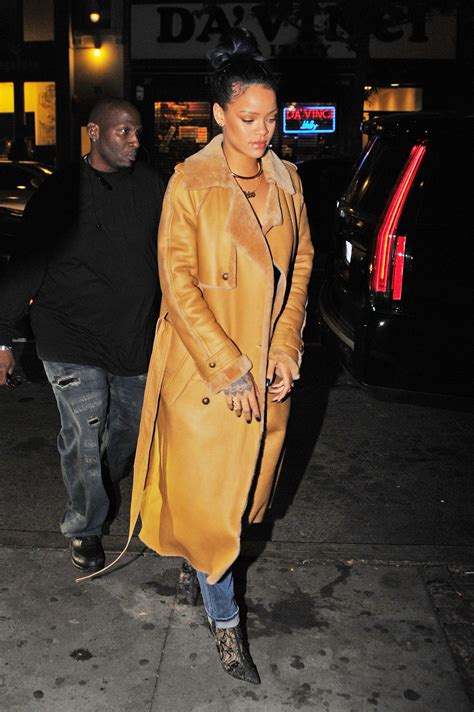 Rihanna wearing a coats